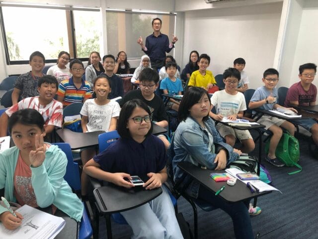 Image of Teacher Jayce With Students in Class